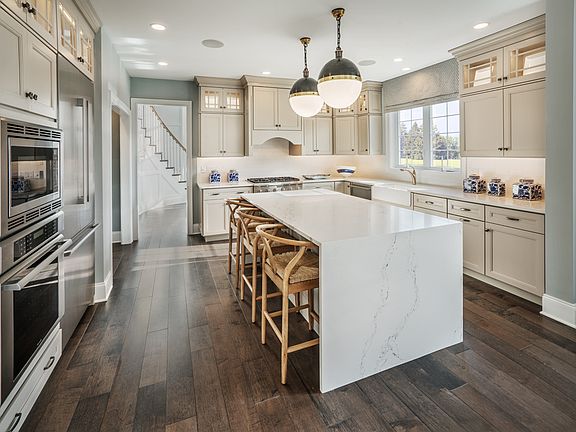 Well-Appointed Kitchen With Granite Countertops and Stainless Steel Appliances