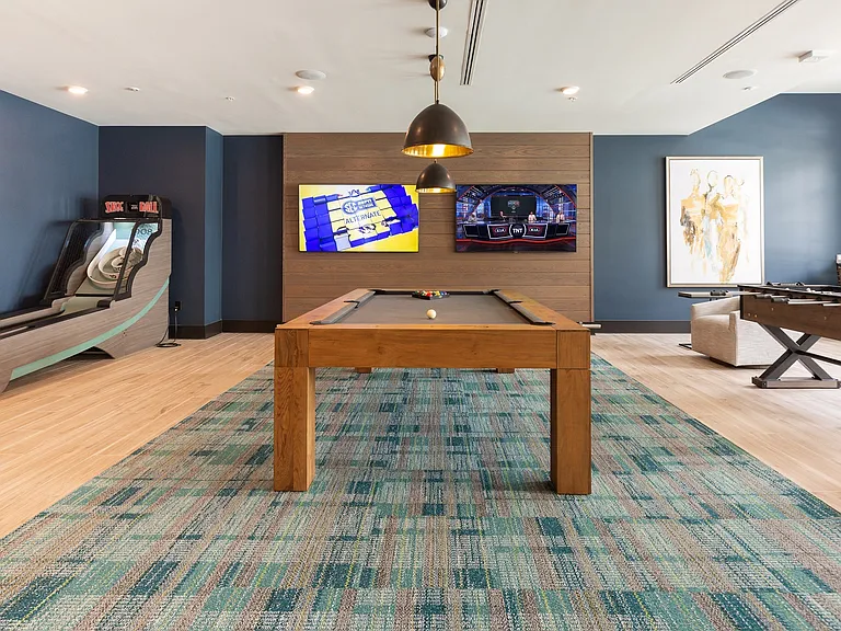 The gaming lounge features billiards, skeeball and foosball.
