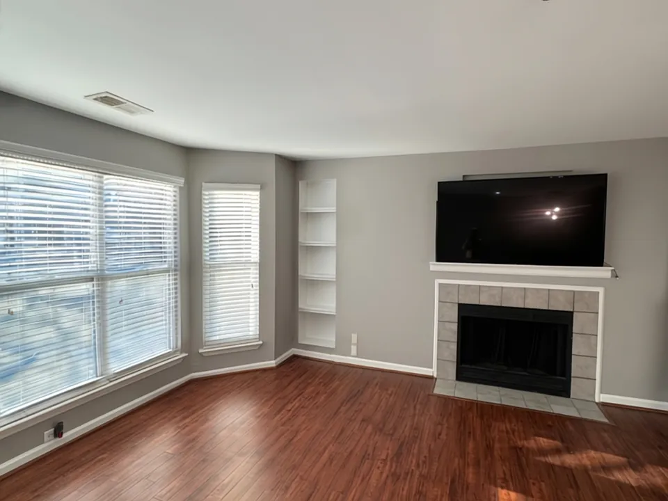 Living room, fireplace and bookshelf built into the wall