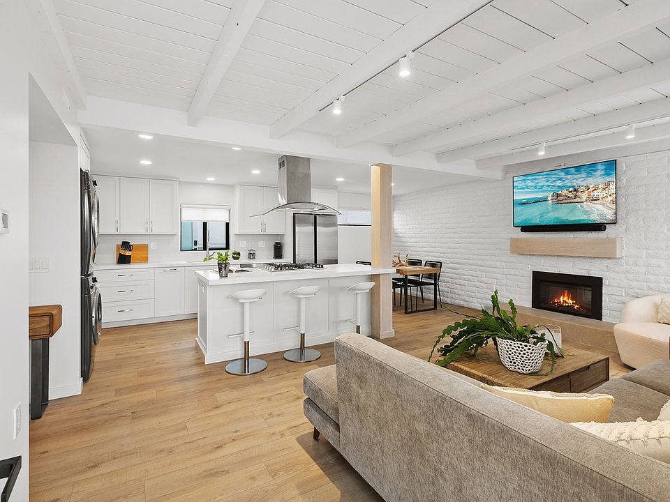 Open concept living, complete with fireplace