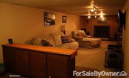 finished basement with gas fireplace
						:
						Off to the right is another bedroom. Great for a teenager.