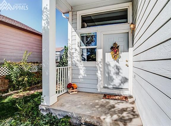 Peaceful front porch welcomes you home!