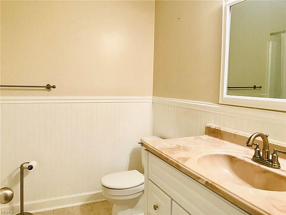 Hall Bath with amazing Beadboard Paneling.