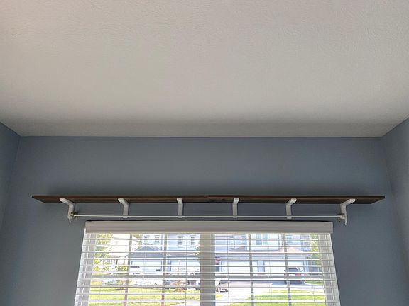 Den with shelf