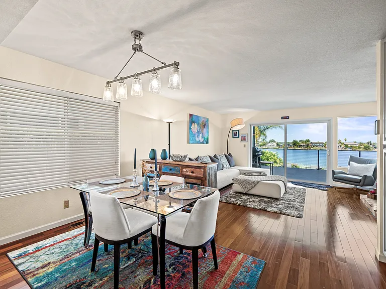 kitchen overlooking living room and deck