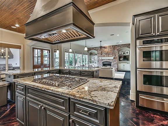 Another view of the spacious kitchen and open floorplan.