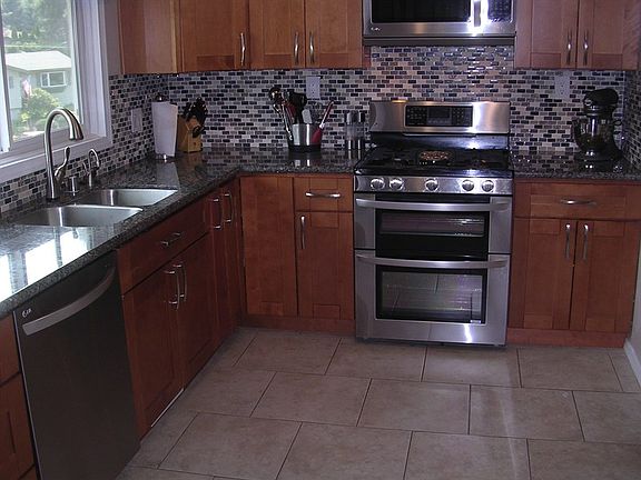 5th image of 6116 E 17th Ave
