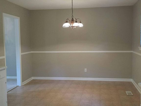Large area next to kitchen for a table