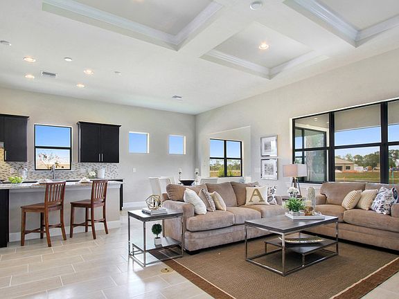 Model Representation Gathering room with plenty of natural light and decorative coffered ceiling