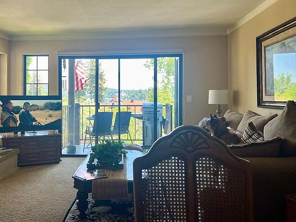 Open Living Room with Deck and Lake View