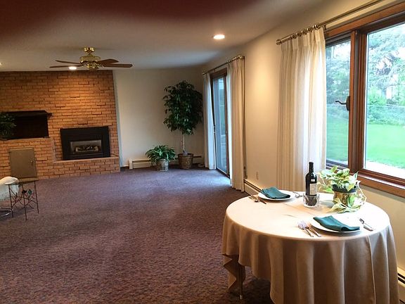 Large windows and patio door allow for lots of natural light