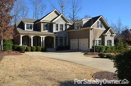 Exterior - Front View
						:
						Large porch w/ wrought-iron swing. Two car garage. Large front and side yards.
