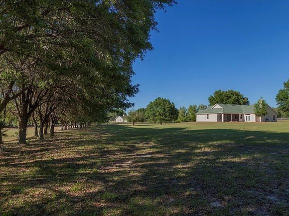Back of the house from the southwest corner of the property.