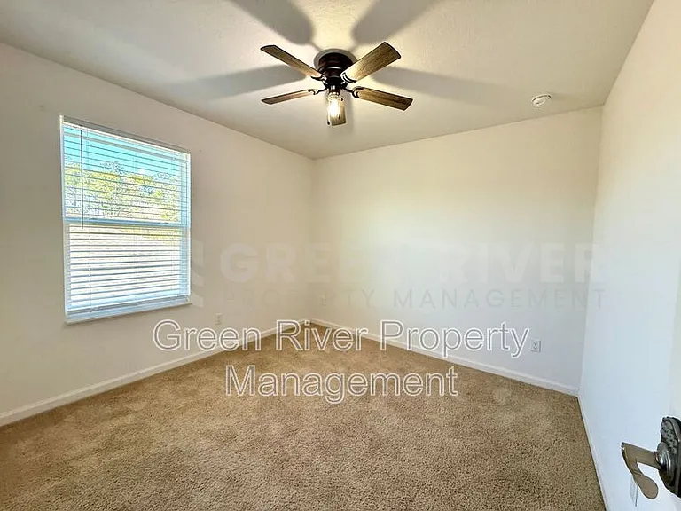 8704 Lake George Cir W — Photo 30