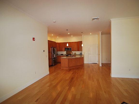 Living room looking into kitchen