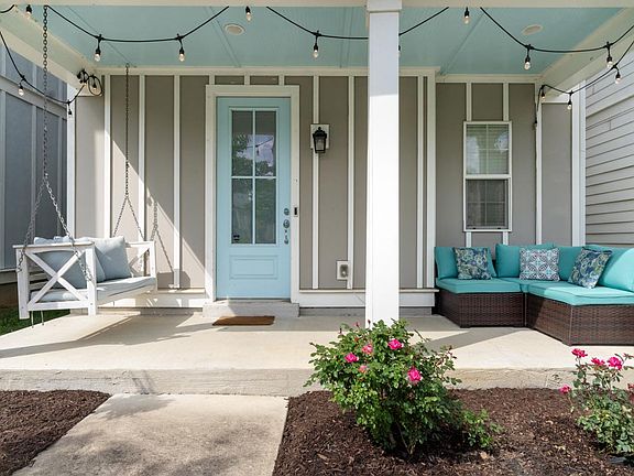 Porch furniture and landscaping maintenance included in the rent.