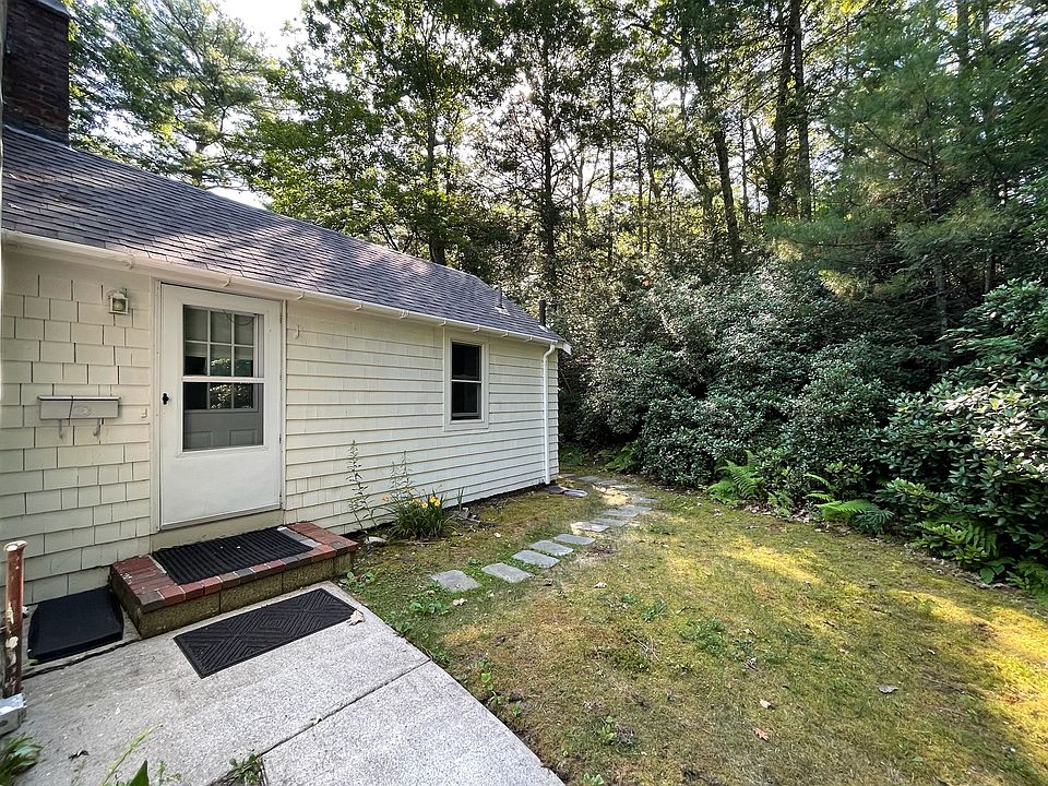 Walkway goes around the rear of the property for a secure main entrance and dedicated back yard space.