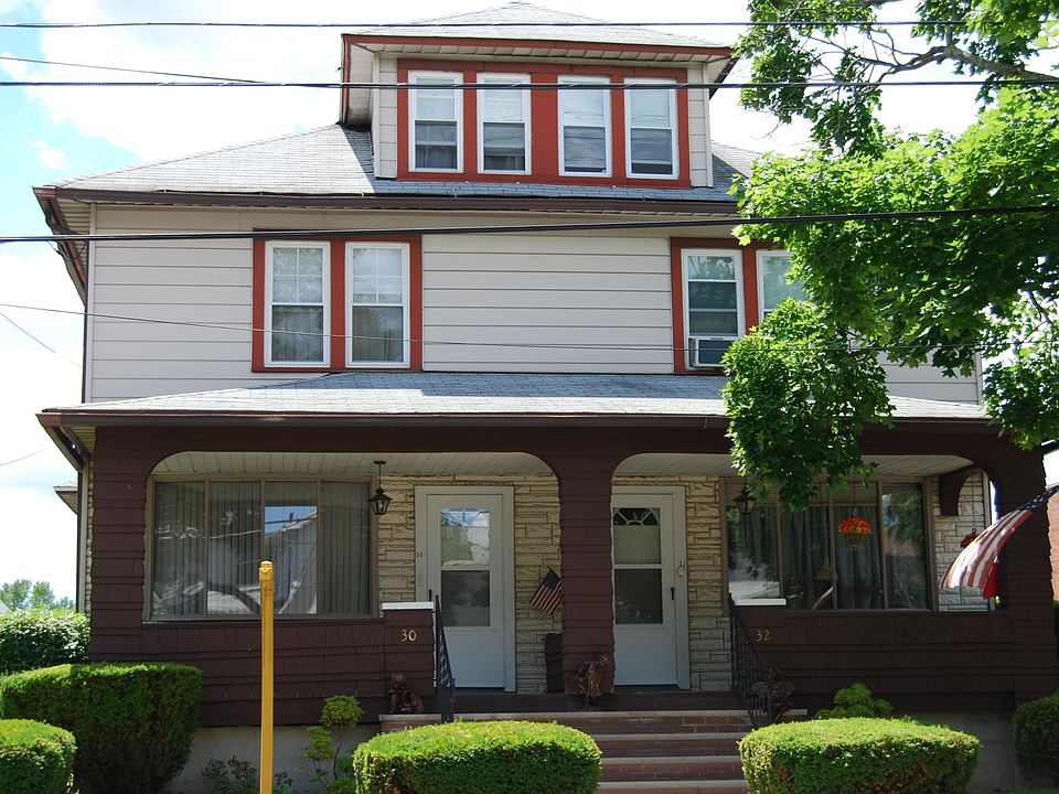 30 Crisman Street is the left side of the double block house