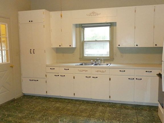 The kitchen measures 13'x 15' and has plenty of storage and work space.