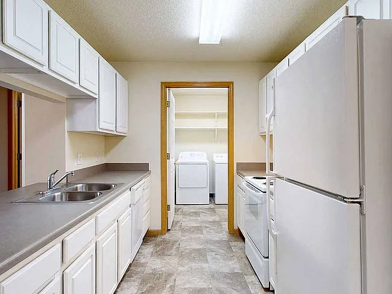 Enjoy the convenience of an in-home laundry room just off the kitchenideal for multitasking on busy days.