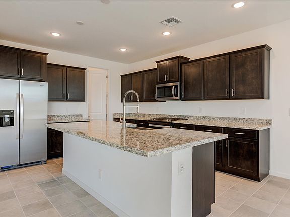 Unlock your inner chef with the spacious kitchen.