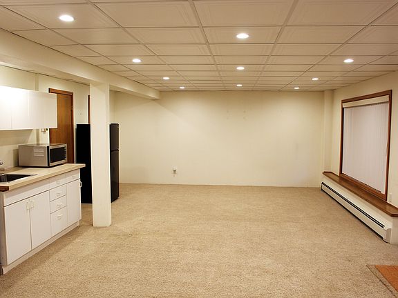 Open floor living area (taken from Left)