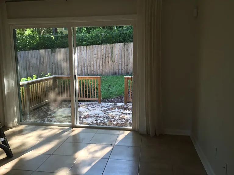 Dining room looking onto backyard deck