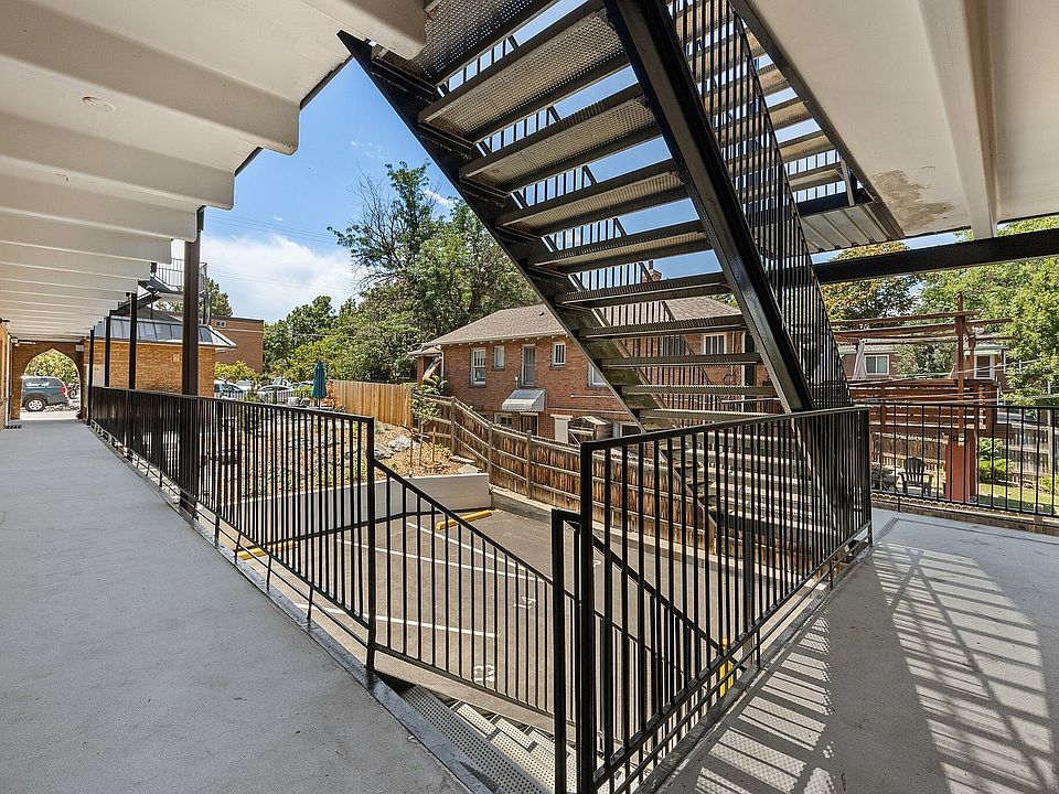 Experience the seamless blend of urban architecture and natural beauty in this inviting apartment setting.