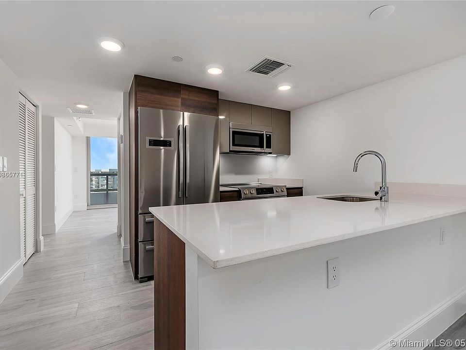 1st image of 9261 E Bay Harbor Dr #80I