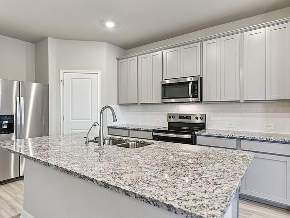 Check out the Callaghan floorplan with the Calm interior package in the Eastern Wells community.