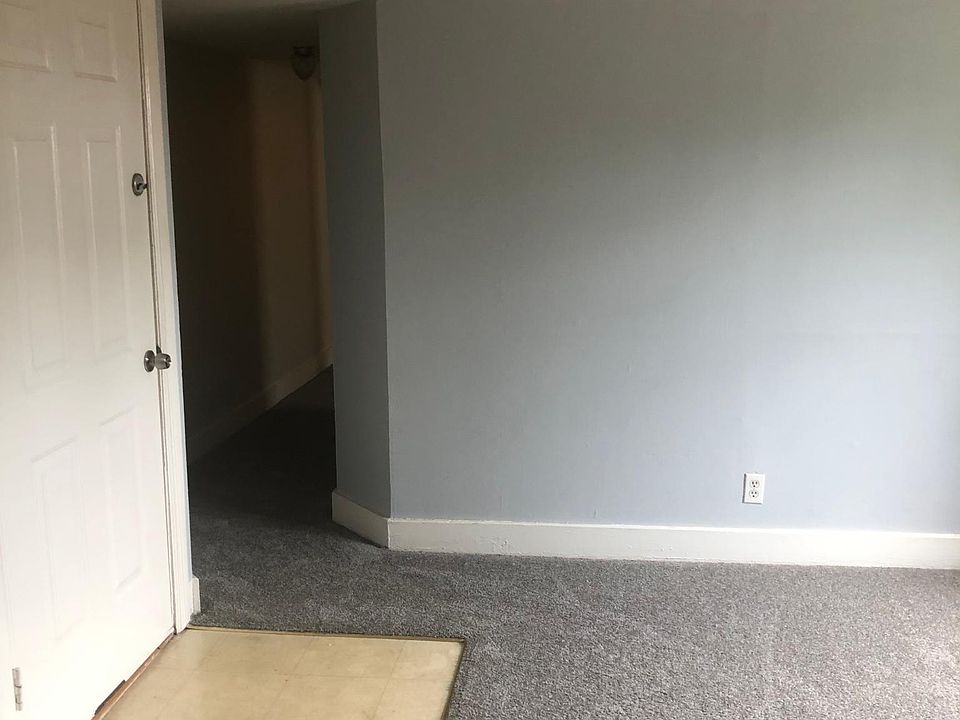Living room with entry door