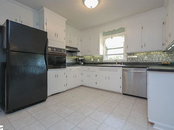 New lighting, hardware, back splash, counter tops, sliding glass door, fresh paint