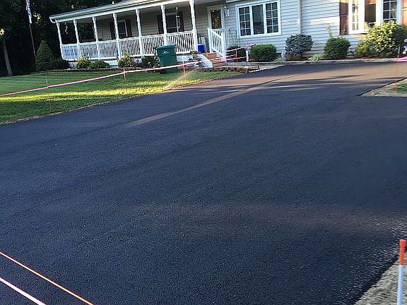 Front of home-new driveway
