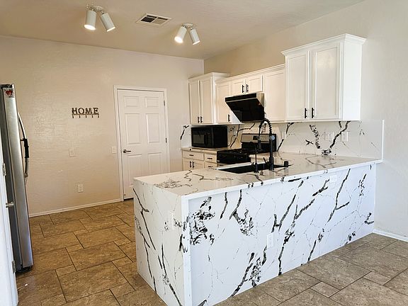 5th image of 8846 S Carradori Ave