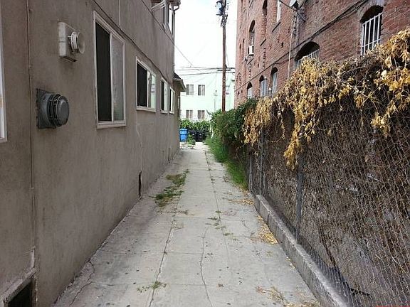Driveway leading to back