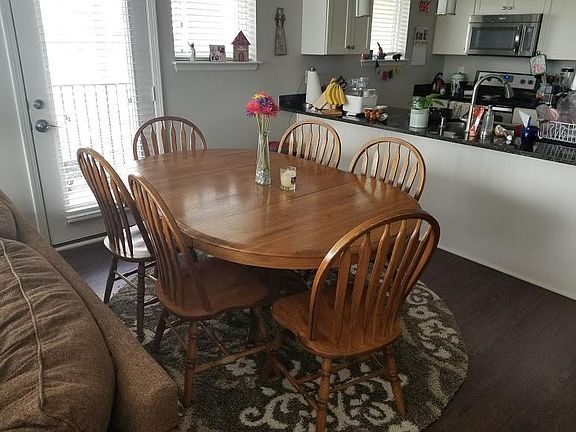 Dining area with doors to the balcony. 