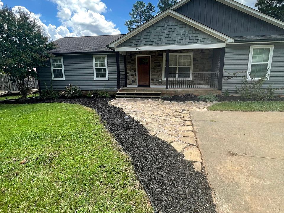 Mulch Rocks Wrapped Gravel Beautiful Flowers New Large Windows throughout!