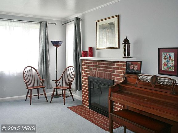 Views of living room w/ more natural light