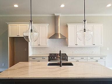 Large island and upgraded appliances.