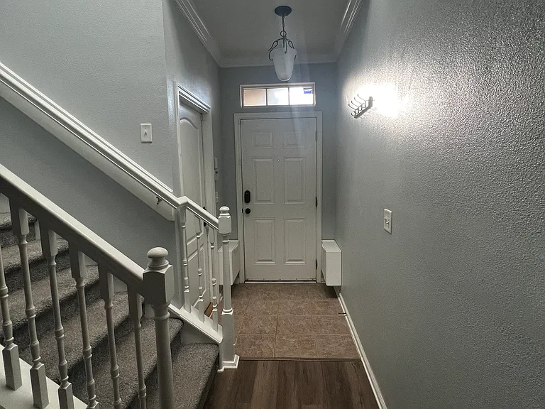 Front entry. Garage to left.