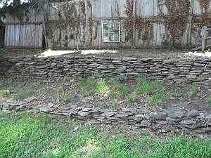 Back yard stonewall and walkway
