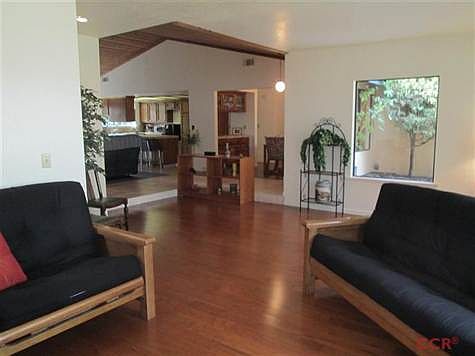 The view showing the openness and the Cathedral ceilings of the house.