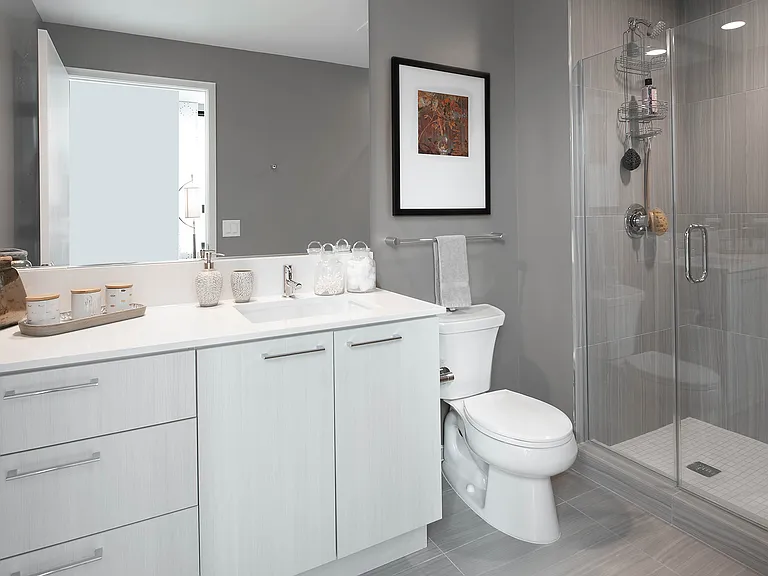 Separate showers with tile surround available in select apartment homes