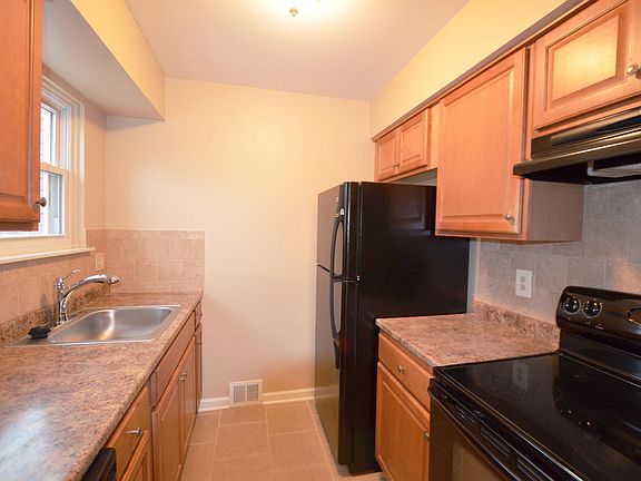 Flush oven and fridge side, microwave included but not shown here in photo