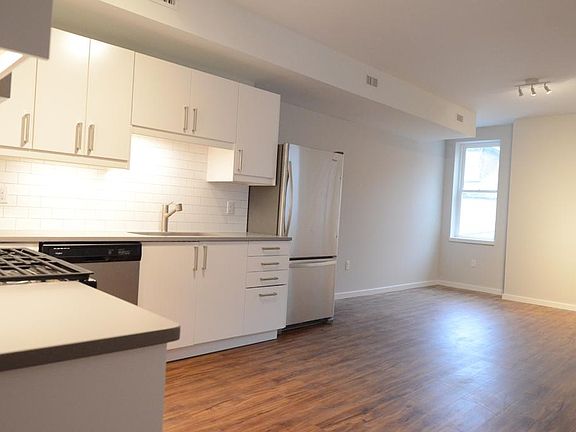 Kitchen opens to living area.