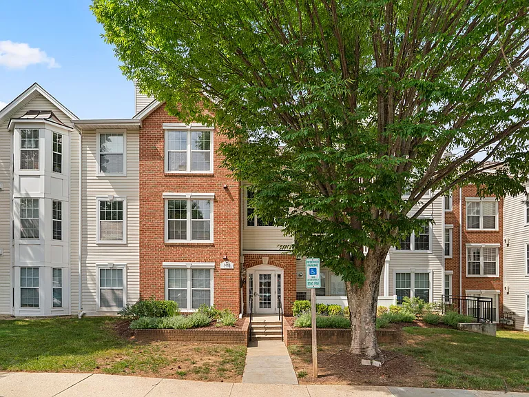 5911 Millrace Ct #J204 — Photo 1
