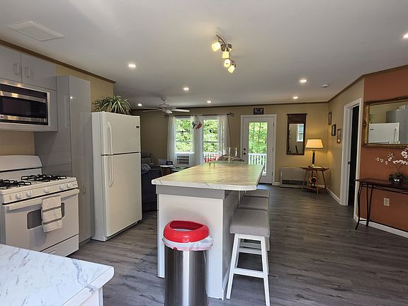 Walking into home from front door.