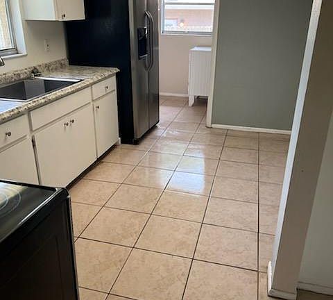 Kitchen, laundry room by window