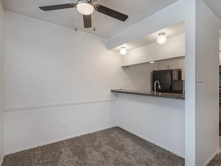 Large dining area and bar access to kitchen