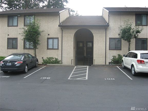 Facing West towards Unit F108. Walk down seven steps to ground floor unit.